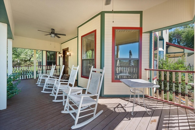 deck with a porch and ceiling fan