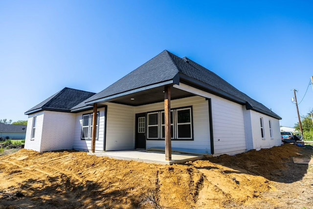 rear view of house with a patio area