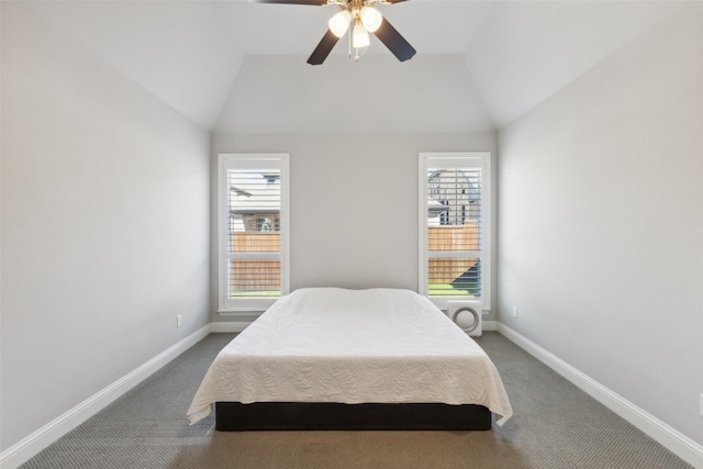 bedroom with vaulted ceiling, carpet, and ceiling fan