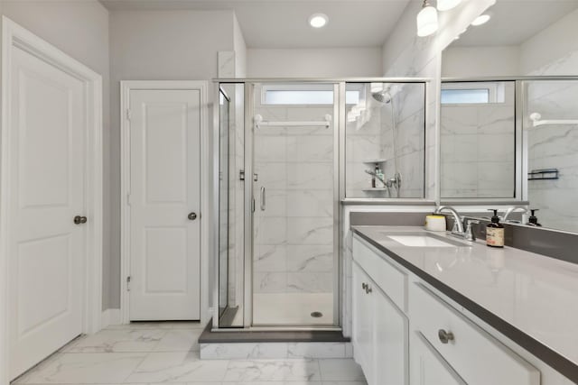 bathroom with vanity and walk in shower