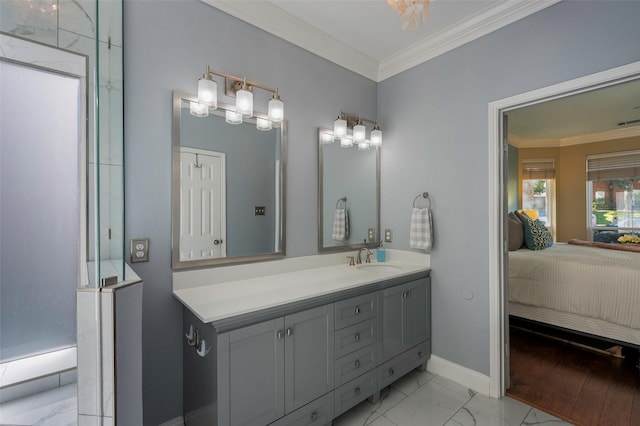 bathroom featuring crown molding and vanity