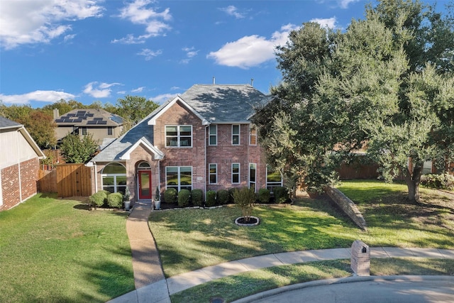 view of front of property featuring a front lawn