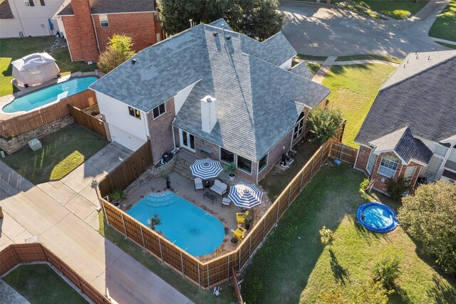 view of swimming pool featuring a patio area, pool water feature, an outdoor hangout area, and french doors