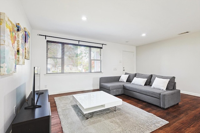 living room with dark wood-type flooring