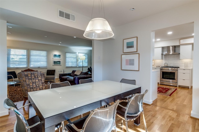 dining area featuring light hardwood / wood-style floors