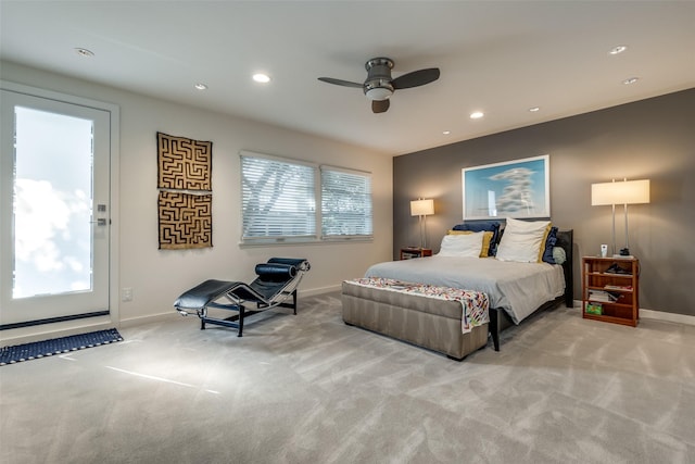 bedroom featuring ceiling fan and light colored carpet