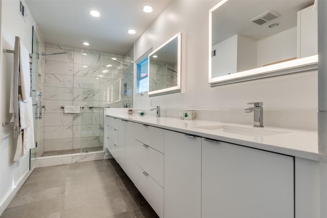 bathroom with vanity and walk in shower