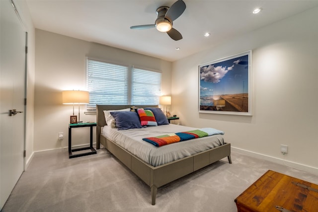 carpeted bedroom with ceiling fan