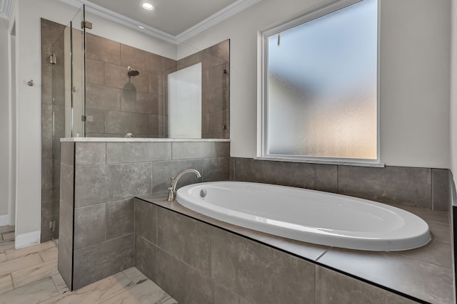 bathroom with ornamental molding and plus walk in shower