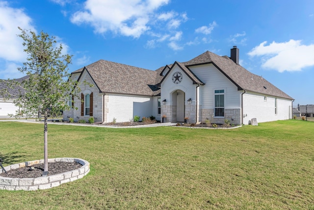 view of front of house with a front lawn