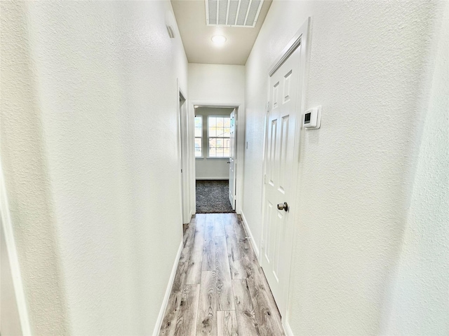 hallway featuring light hardwood / wood-style floors