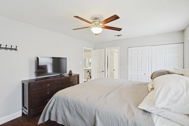 bedroom with ceiling fan, dark hardwood / wood-style floors, and a closet