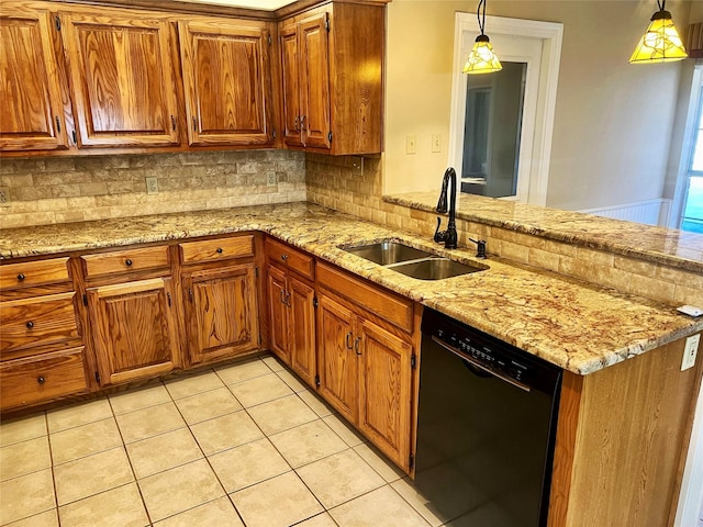 kitchen with pendant lighting, sink, kitchen peninsula, and dishwasher