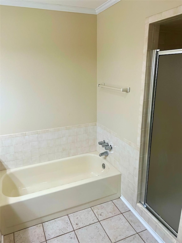 bathroom featuring crown molding, tile patterned floors, and independent shower and bath