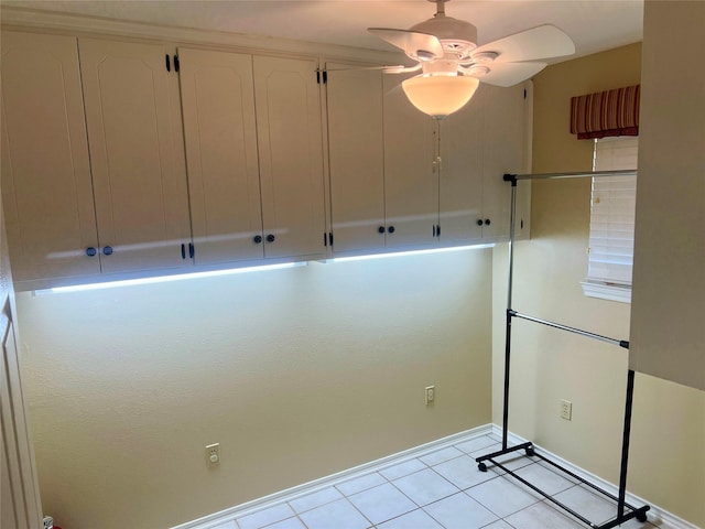 washroom with light tile patterned floors and ceiling fan