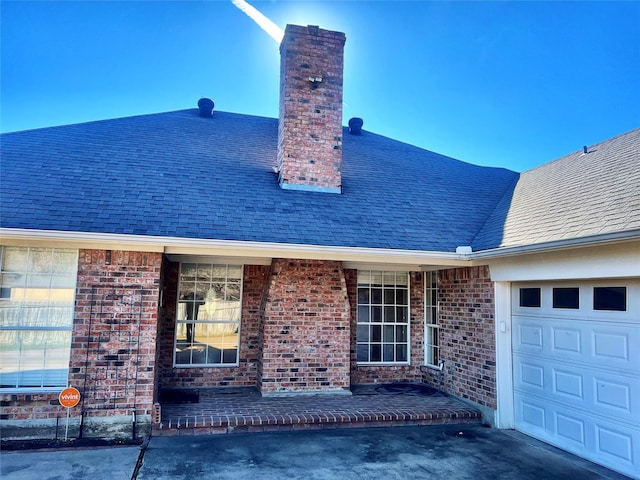 exterior space with a garage