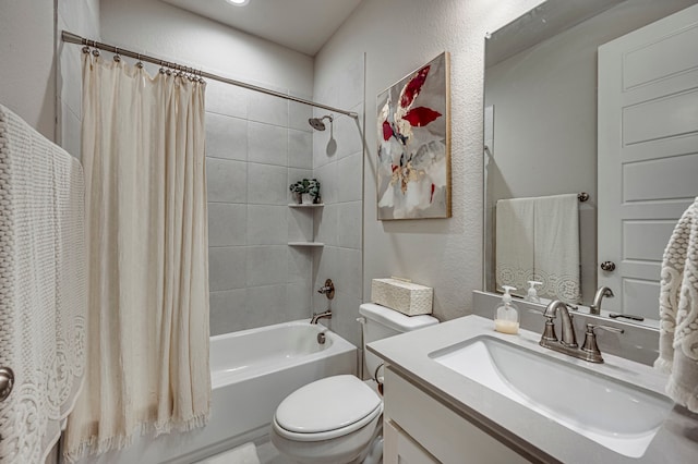 full bathroom with vanity, shower / bath combination with curtain, and toilet