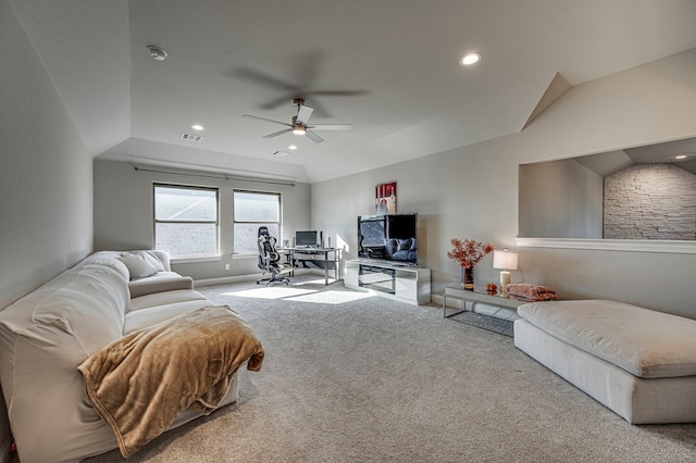 living room featuring carpet, ceiling fan, and lofted ceiling