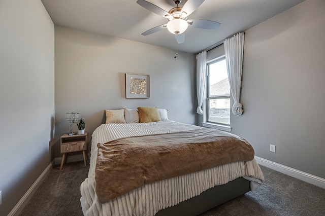 bedroom featuring dark carpet and ceiling fan