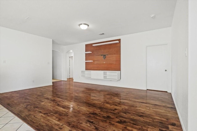 spare room featuring light hardwood / wood-style floors