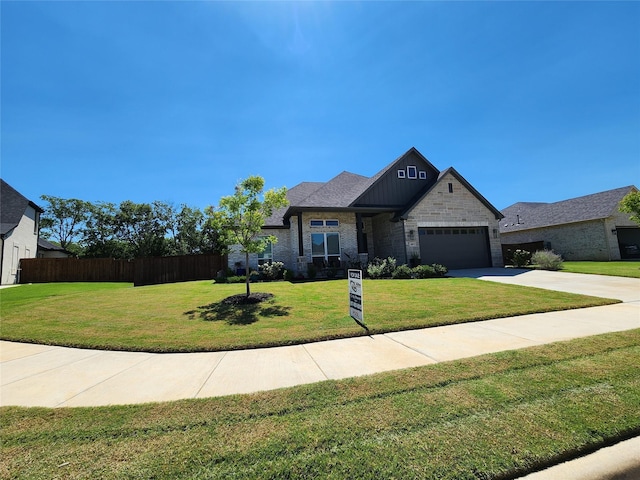 french country inspired facade with driveway, a front lawn, fence, board and batten siding, and a garage