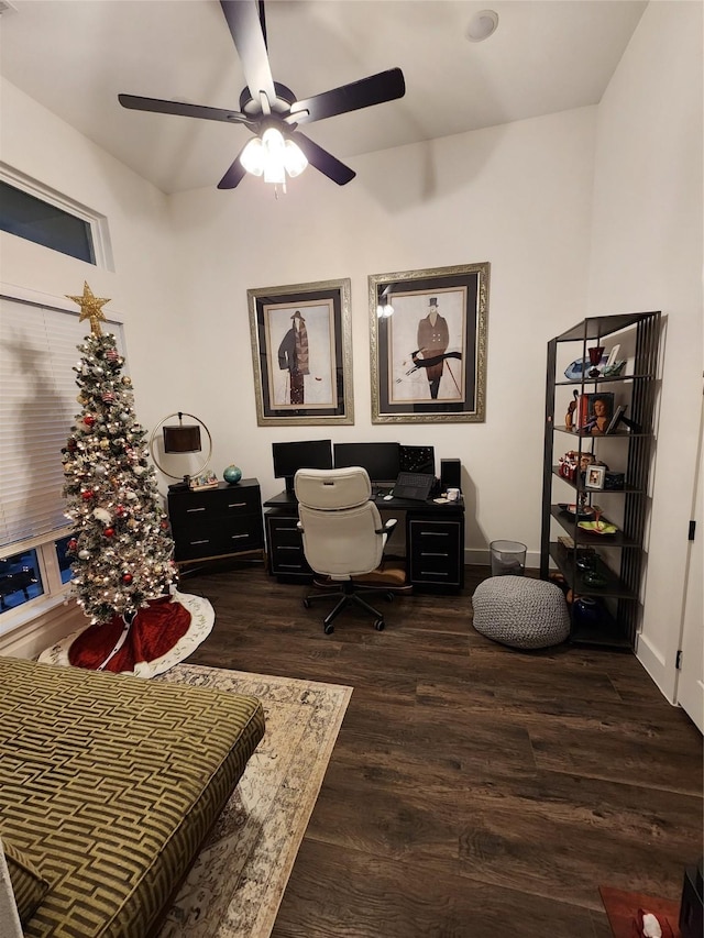 home office featuring dark hardwood / wood-style floors and ceiling fan