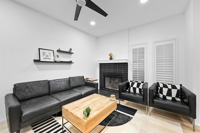 3635 Garden Brook Dr Unit 1200, Farmers Branch, TX 75234 - living room featuring a ceiling fan, recessed lighting, a tile fireplace, and wood finished floors
