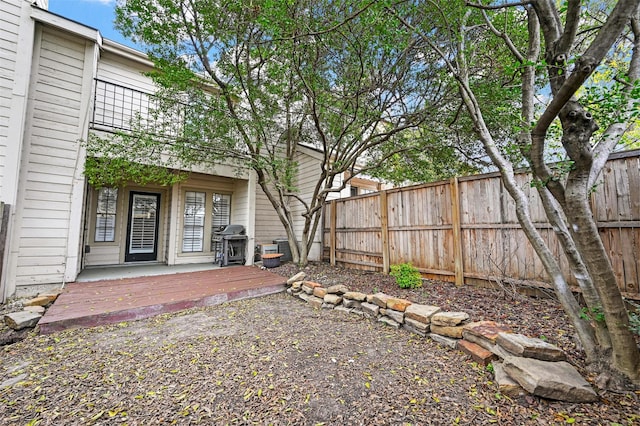 view of yard with a wooden deck