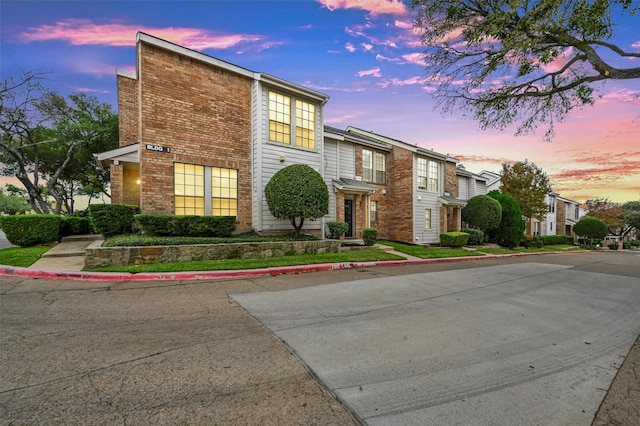 3635 Garden Brook Dr Unit 1200, Farmers Branch, TX 75234 - view of front of property featuring brick siding