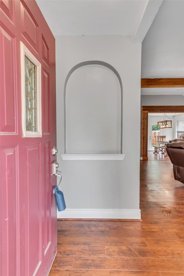 foyer entrance featuring hardwood / wood-style floors