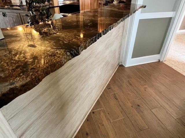 details featuring wood-type flooring