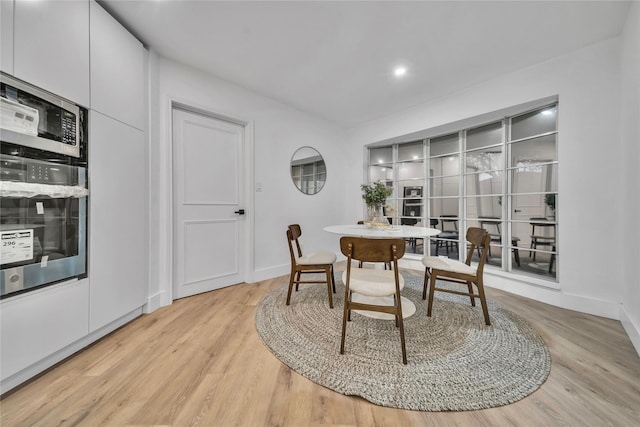 dining room featuring light hardwood / wood-style floors