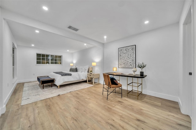 bedroom with light hardwood / wood-style flooring