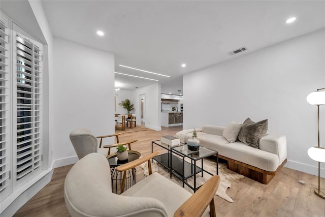 living room featuring light wood-type flooring