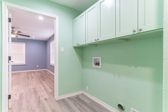 washroom with cabinets, light wood-type flooring, hookup for a washing machine, ceiling fan, and hookup for an electric dryer