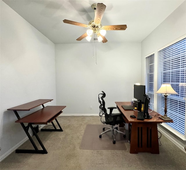 office with ceiling fan and light carpet