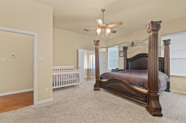 bedroom with ceiling fan and carpet