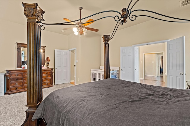 bedroom featuring light carpet, ceiling fan, and lofted ceiling