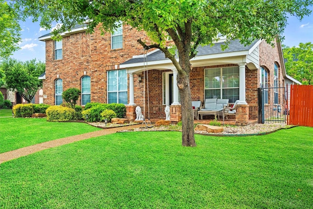 view of front of home with a front lawn