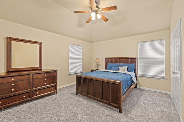 carpeted bedroom featuring ceiling fan and lofted ceiling