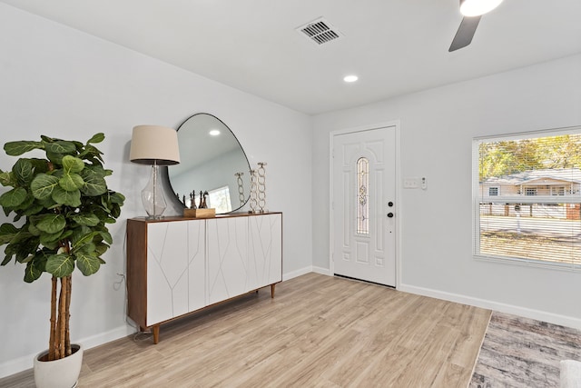 entryway featuring ceiling fan and light hardwood / wood-style floors