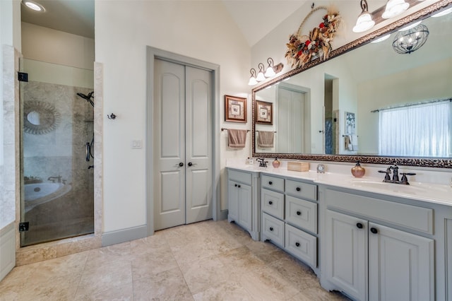 117 Woodland Dr, Krugerville, TX 76227 - bathroom featuring a shower stall, double vanity, and lofted ceiling