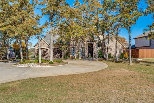 view of front of house with a front lawn