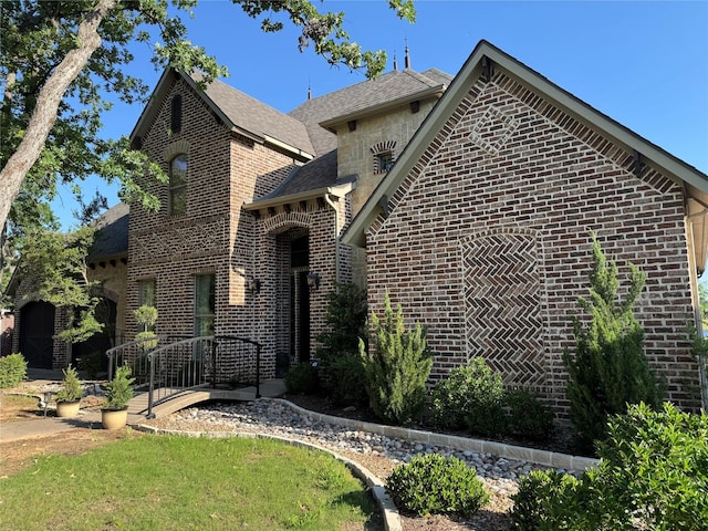 117 Woodland Dr, Krugerville, TX 76227 - view of front of house featuring brick siding and a shingled roof
