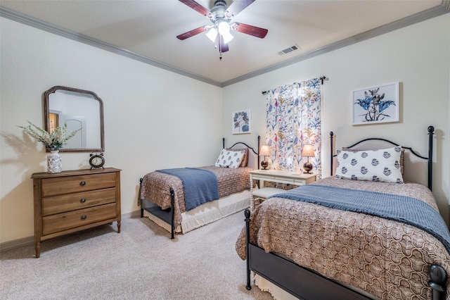 bedroom with ceiling fan, crown molding, and light colored carpet