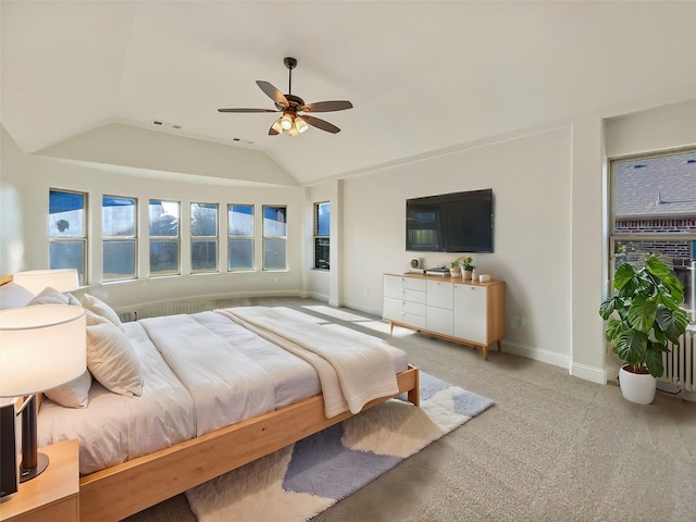 bedroom with light colored carpet, ceiling fan, and lofted ceiling