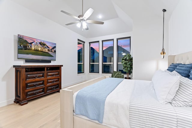 bedroom featuring ceiling fan and light hardwood / wood-style floors