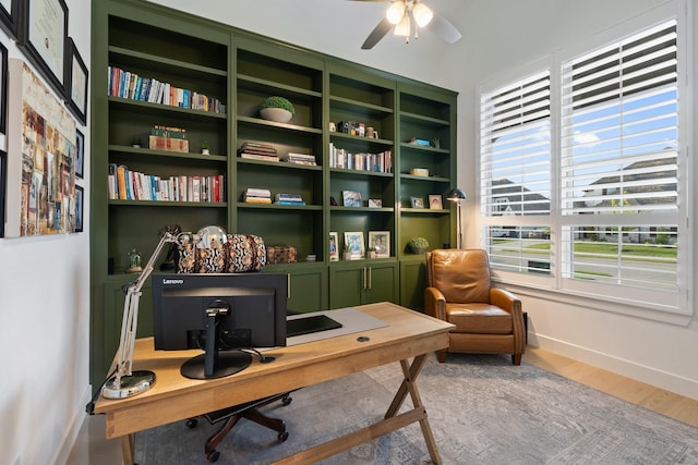 office area featuring wood-type flooring and ceiling fan