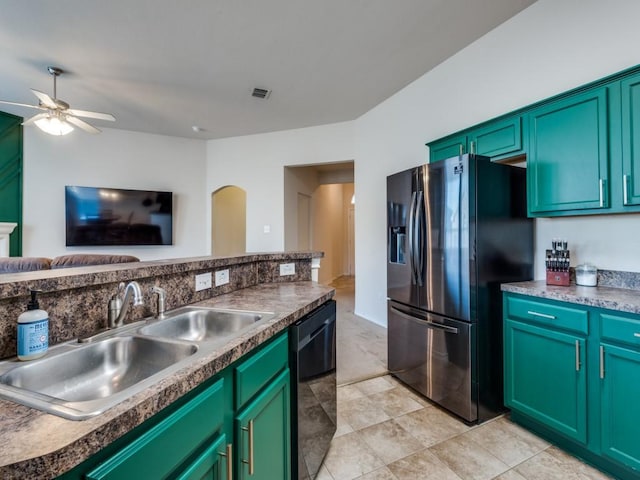 kitchen with dishwasher, ceiling fan, sink, and stainless steel refrigerator with ice dispenser