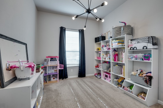 game room with light carpet and a chandelier